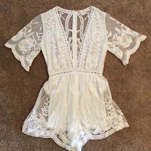 White lace romper from vestique! Size small.